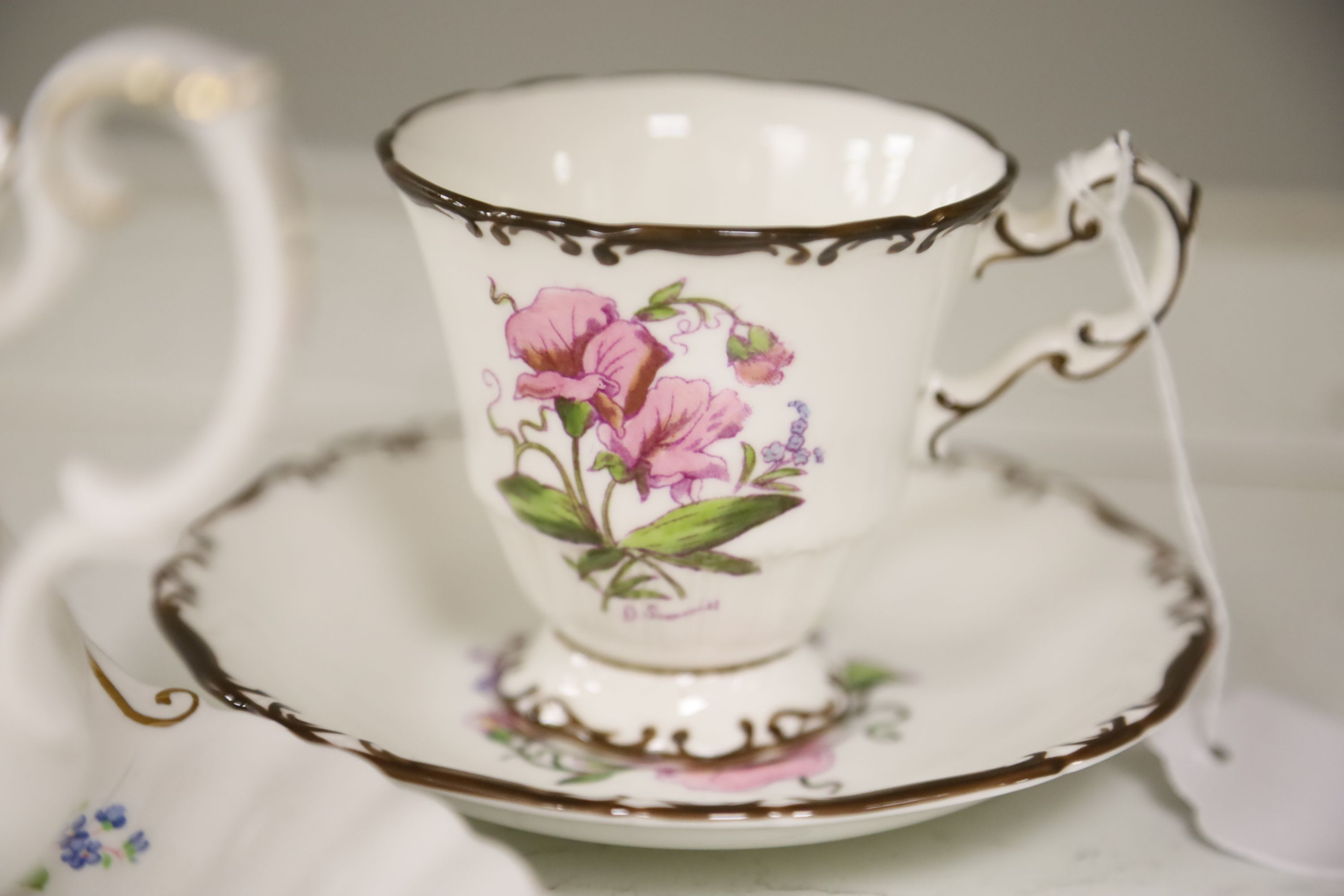 A Royal Albert Moss Rose pattern tea service (41-pce) and a set of four Coalport botanical cups and saucers